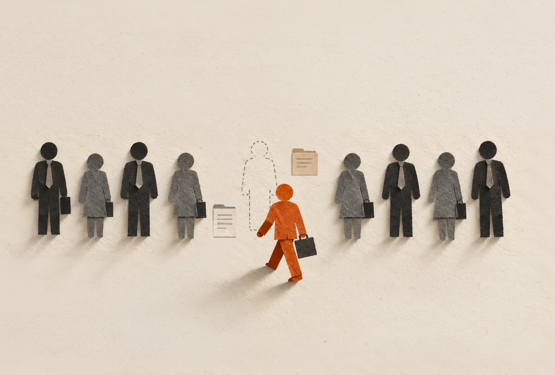 Employment discrimination-Person walking with briefcase between to rows of of people lined up.